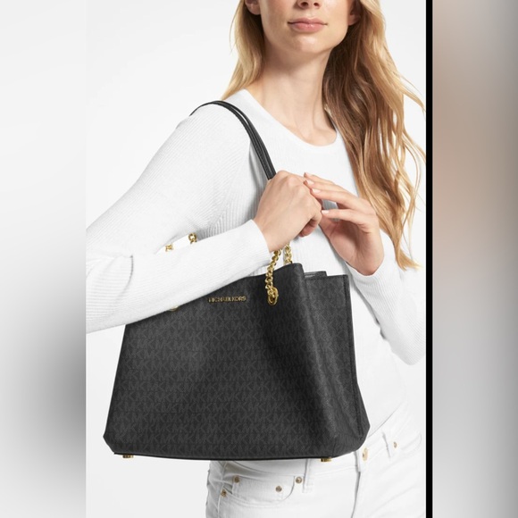 Brand new Michael kors black leather signature purse